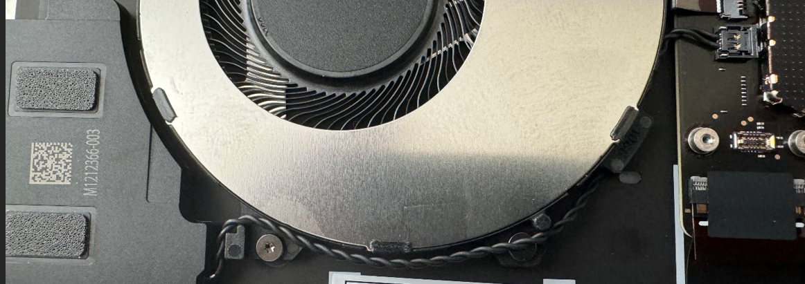 Screenshot that shows routing the right speaker wire and inserting its connector into the motherboard receptacle.