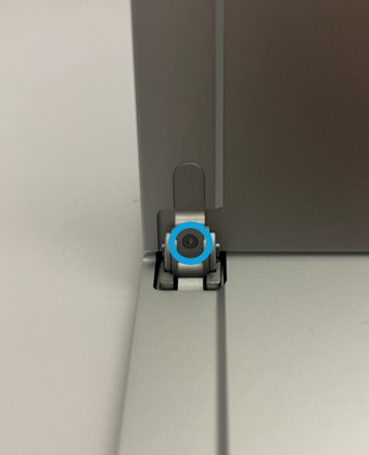 Screenshot that shows removing a hinge screw from the kickstand hinge using a 3IP (Torx-Plus) driver.