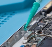 Photo that shows applying thermal paste to the inner metal surface near the heat sink area.