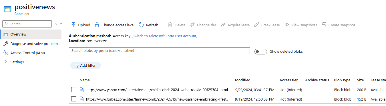 Screenshot shows blob container with positive news articles.