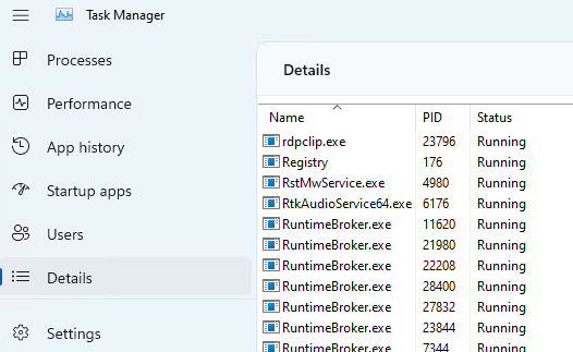 Screenshot of Task Manager Details tab showing process IDs in the PID column.